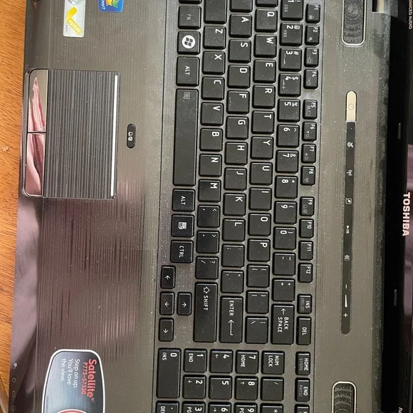 Toshiba Black Laptop with Windows working well but it’s old